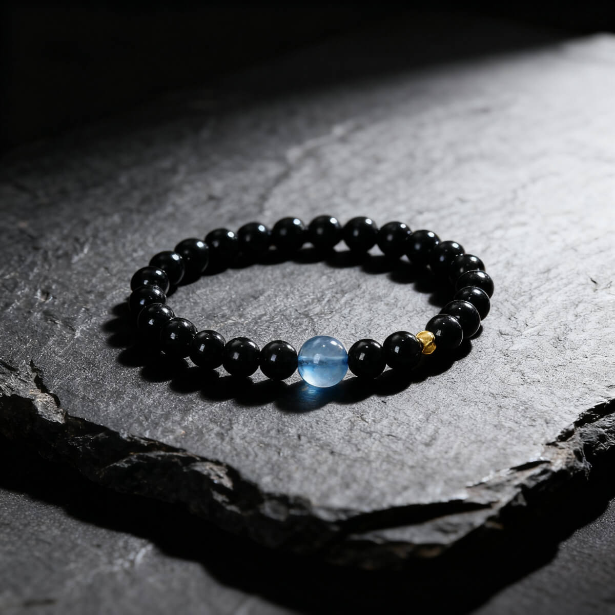 Void Series Obsidian Bracelet with Blueberry - Polished Black Stones on Textured Slate