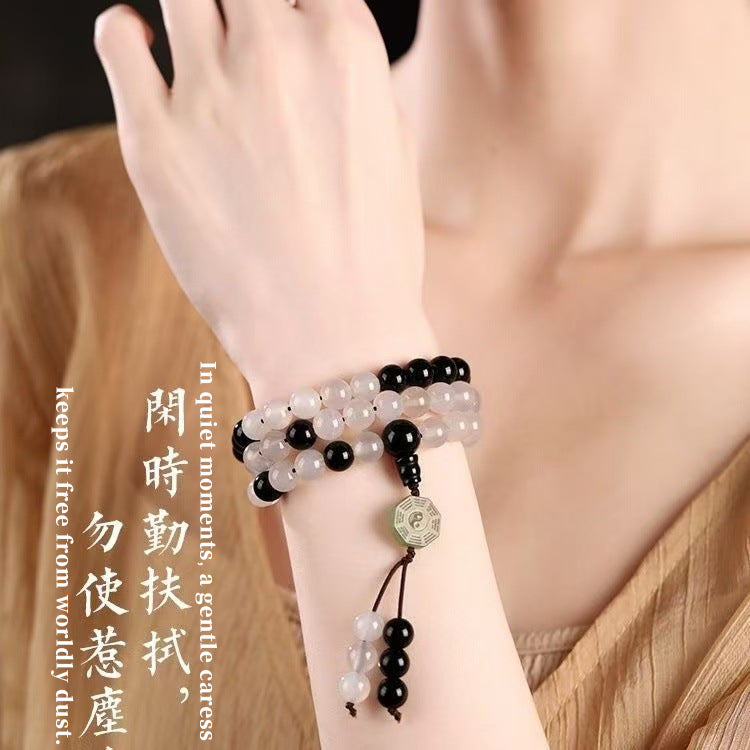 Close-up photo of the bracelet with a measuring scale, detailing the precise dimensions of all beads, including the 13x5mm Hetian Nephrite focal piece, 6mm White Chalcedony, and 6mm Black Obsidian, with a total weight of 31-35g.